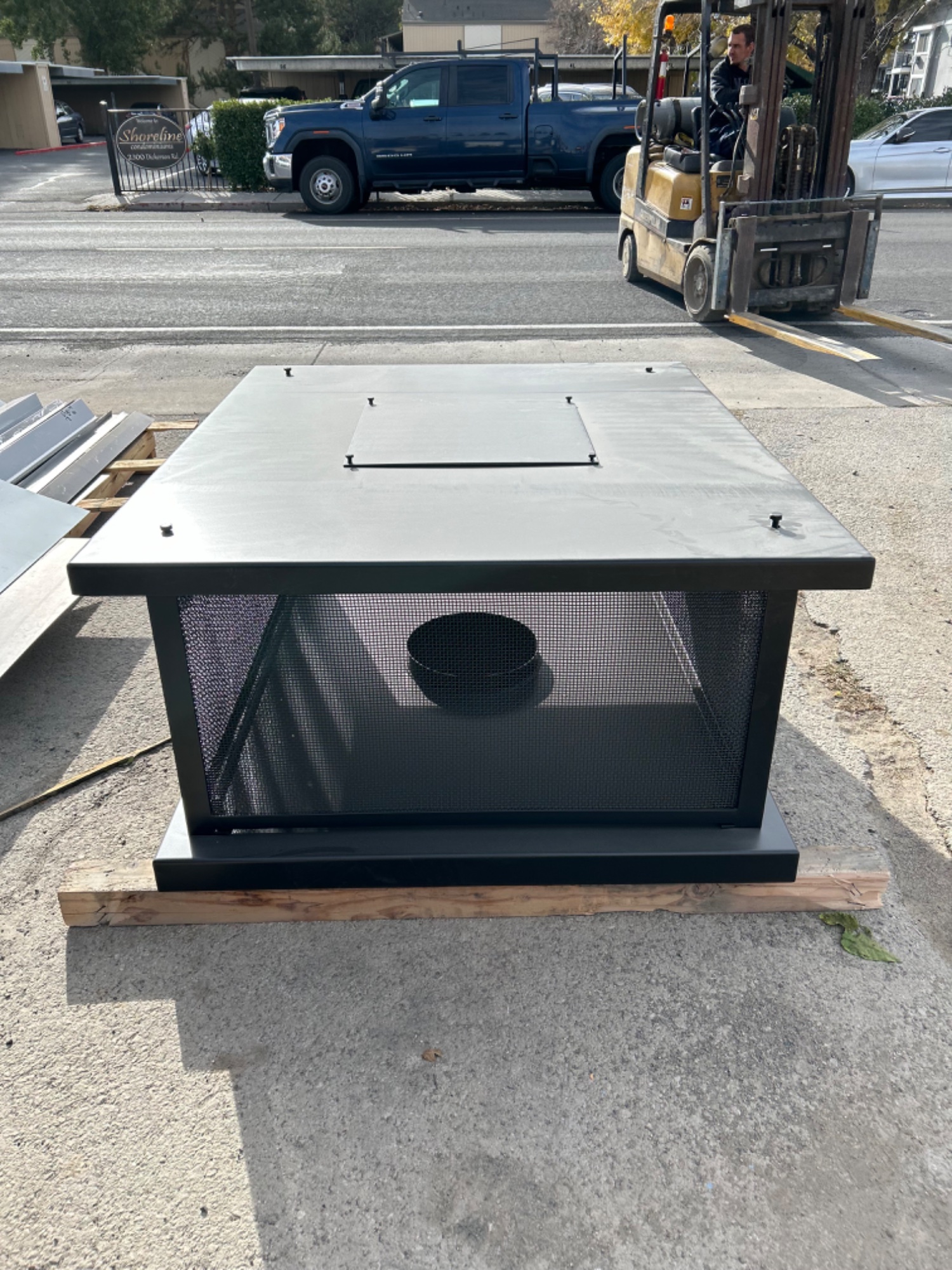 Black chimney cap with flue pipe ready for delivery